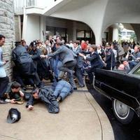 Photo of the assassination attempt on President Reagan. Dirck Halstead Photographic Archive, Dolph Briscoe Center for American History.